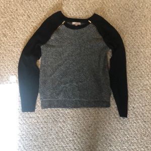 lightly worn. super cute gold zippers on top